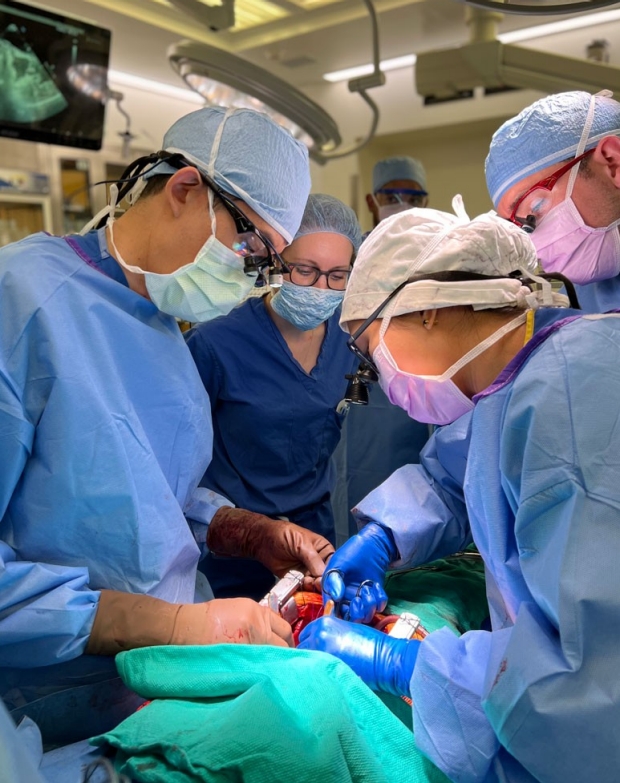 three surgeons in OR