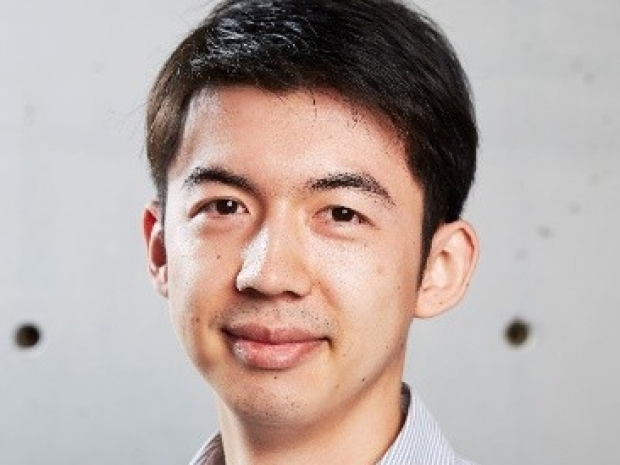 smiling headshot of Dr. Alex Chan