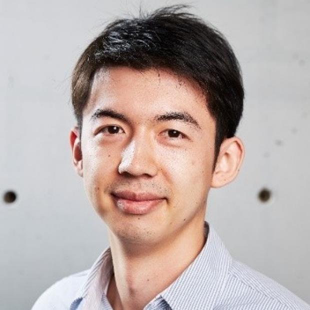 smiling headshot of Alex Chan