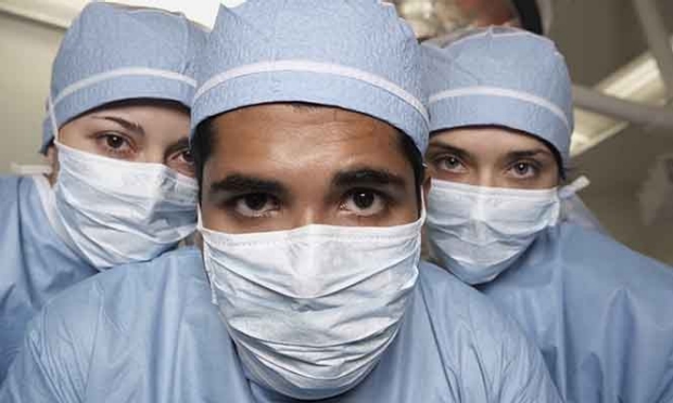 photo of three surgeons 