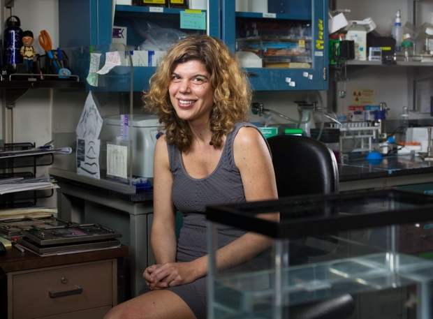 Scientist sitting in her lab