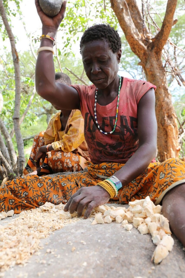 Hadza woman grinding grain