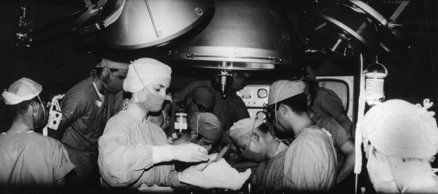 Black-and-white photo of the 1968 heart transplant surgery at Stanford