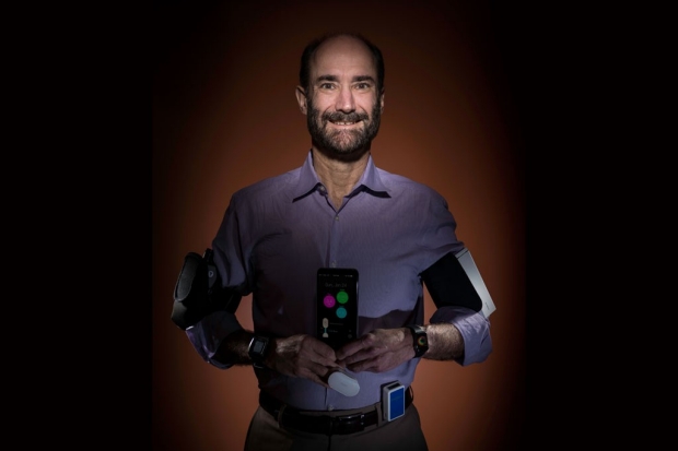 Man with several wearable devices