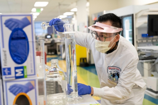 senior clinical laboratory scientist at Stanford Health Care prepares reagents