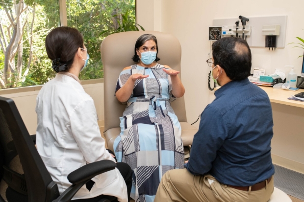 patient meets with two doctors at Stanford's Post-Acute COVID-19 Syndrome Clinic